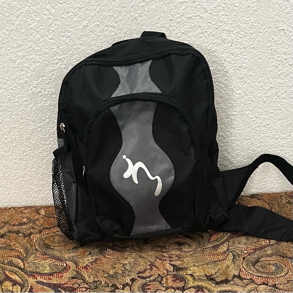 In Motion Crossbody men’s backpack